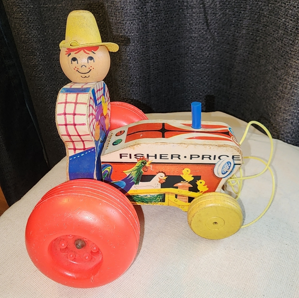 1961 Fisher-Price Farmer on Tractor Pull Toy